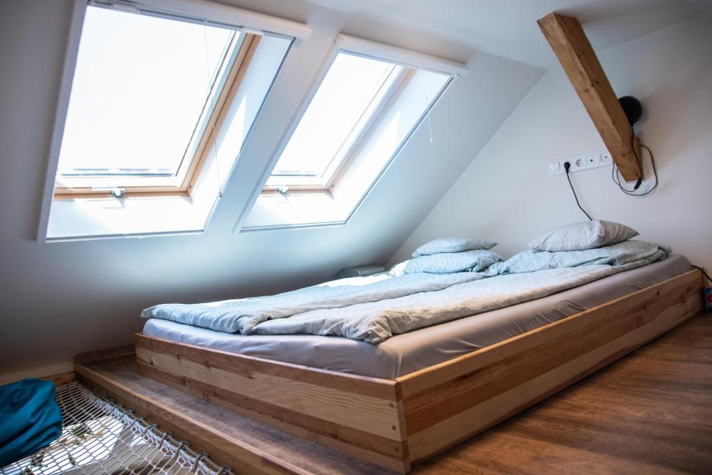 A bed or beds in a room at Treehouse apartment