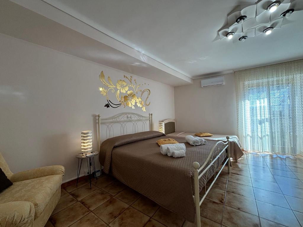 Postel nebo postele na pokoji v ubytování A Rua Camera con bagno privato vicino al Duomo