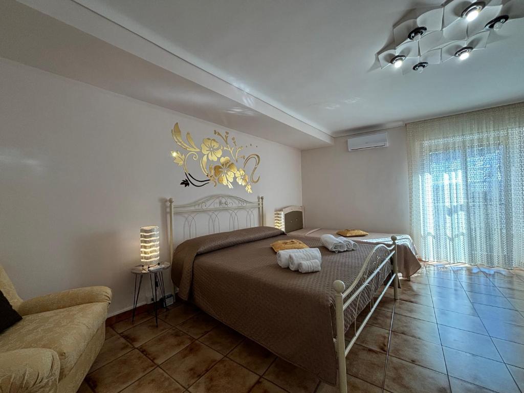 Postel nebo postele na pokoji v ubytování A Rua Camera con bagno privato vicino al Duomo