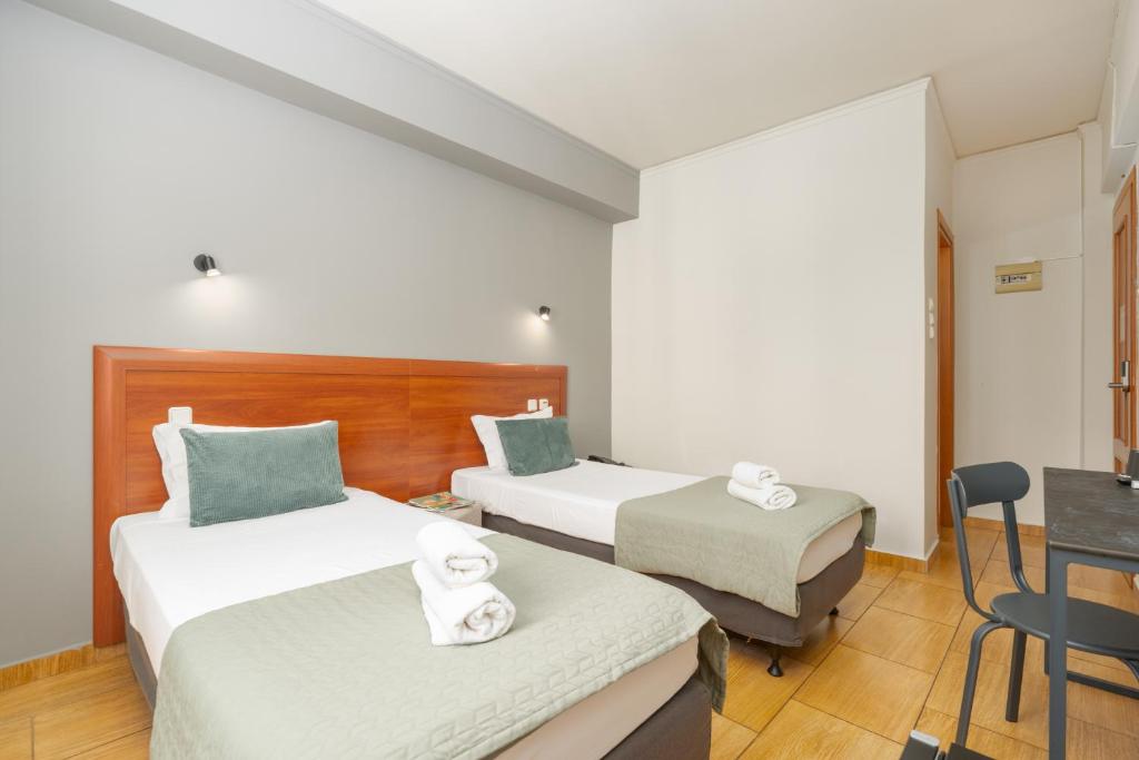 Letto o letti in una camera di Stalis Hotel