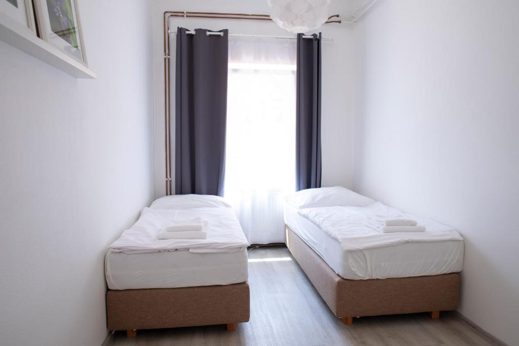 Postel nebo postele na pokoji v ubytování Amenity Apartmány Perná