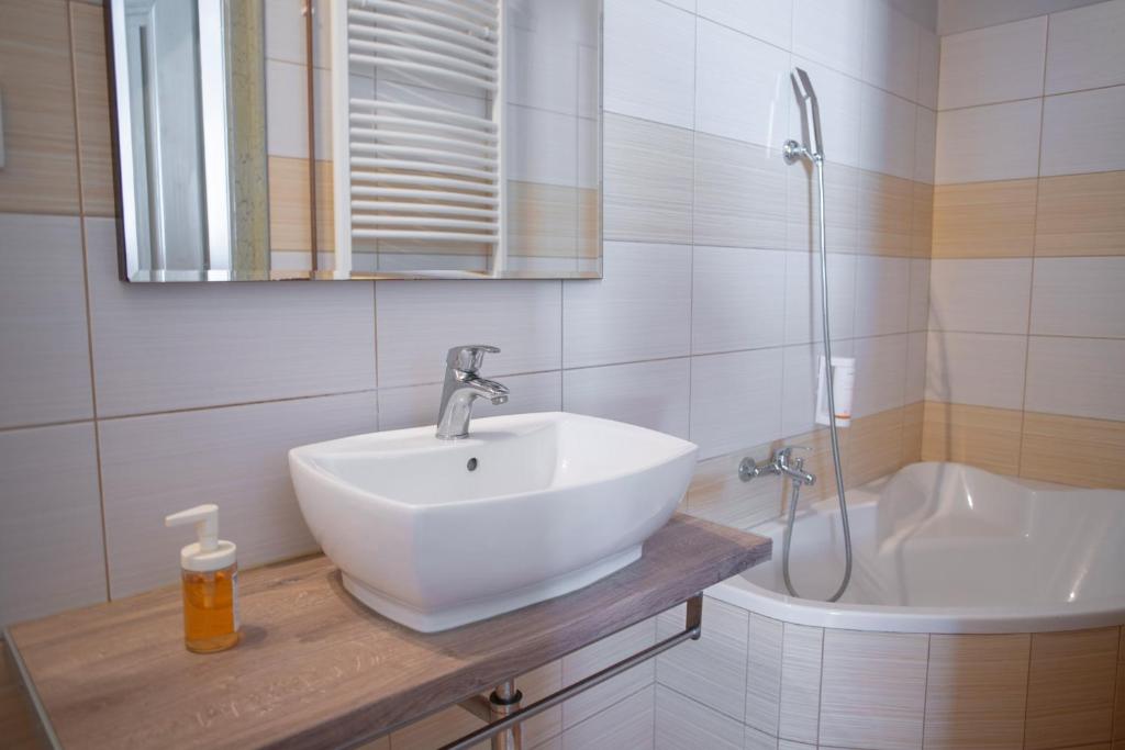 Koupelna v ubytování Amenity Apartmány Perná