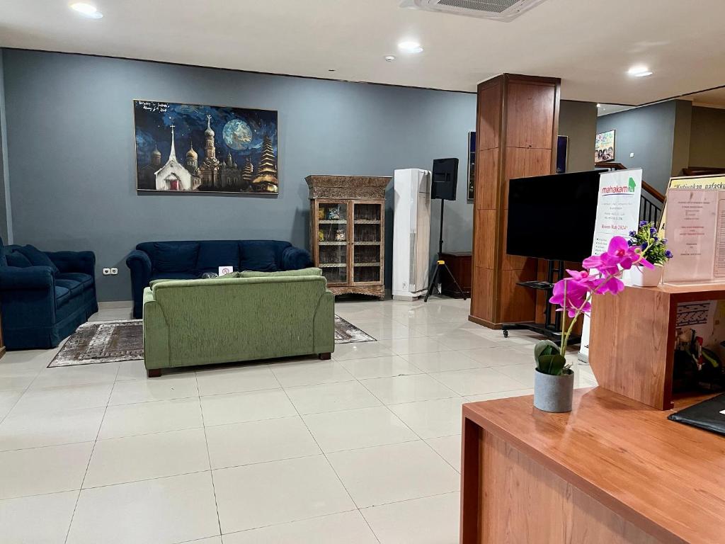 TV a/nebo společenská místnost v ubytování Mahakam24 Residence