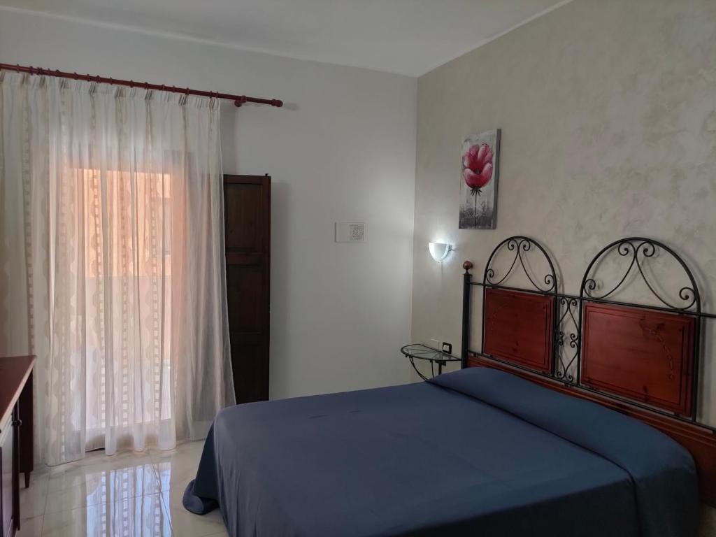 Postel nebo postele na pokoji v ubytování Grand Hotel Mosè