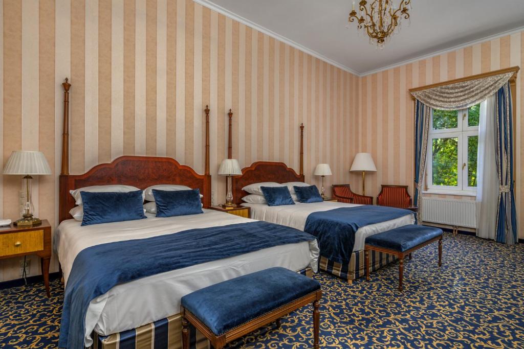 Postel nebo postele na pokoji v ubytování Ensana Grand Margaret Island