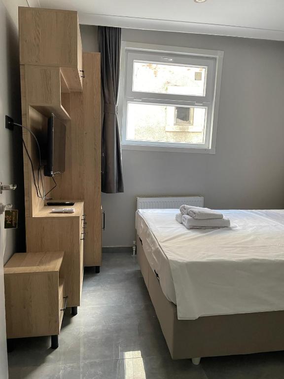 Postel nebo postele na pokoji v ubytování moonlight hotel