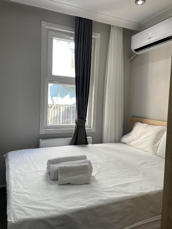Postel nebo postele na pokoji v ubytování moonlight hotel