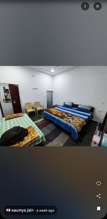 Postel nebo postele na pokoji v ubytování Happy Homestay