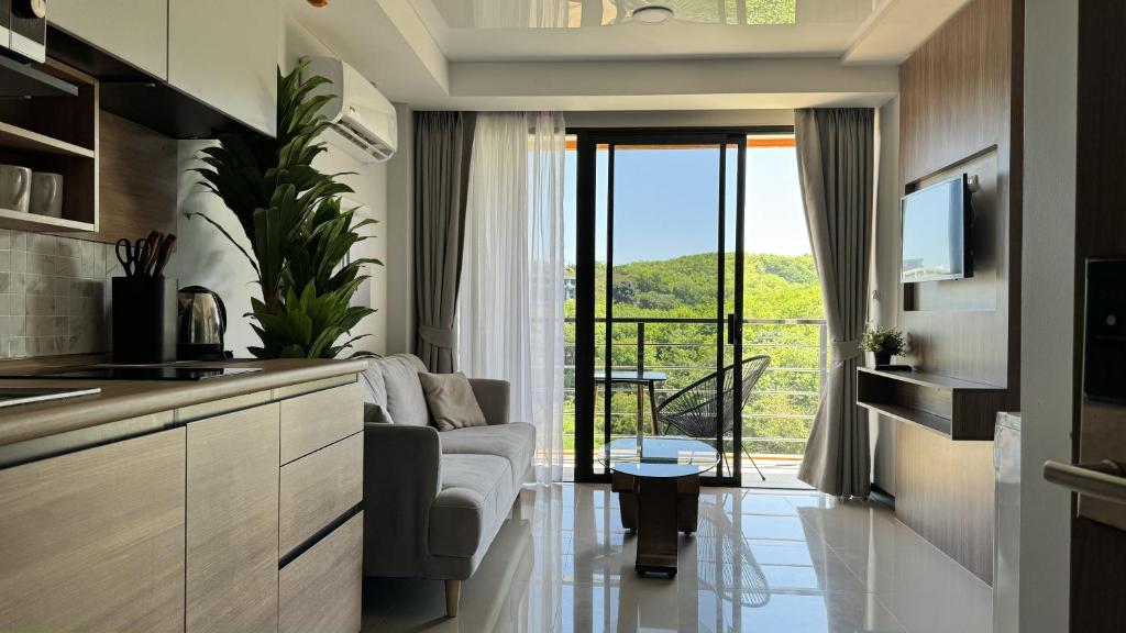 Fotografie z fotogalerie ubytování Naiharn Sea Condominium v destinaci Rawai pláž