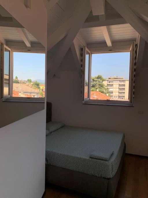 Postel nebo postele na pokoji v ubytování Appartamento con 2 stanze e 2 bagni