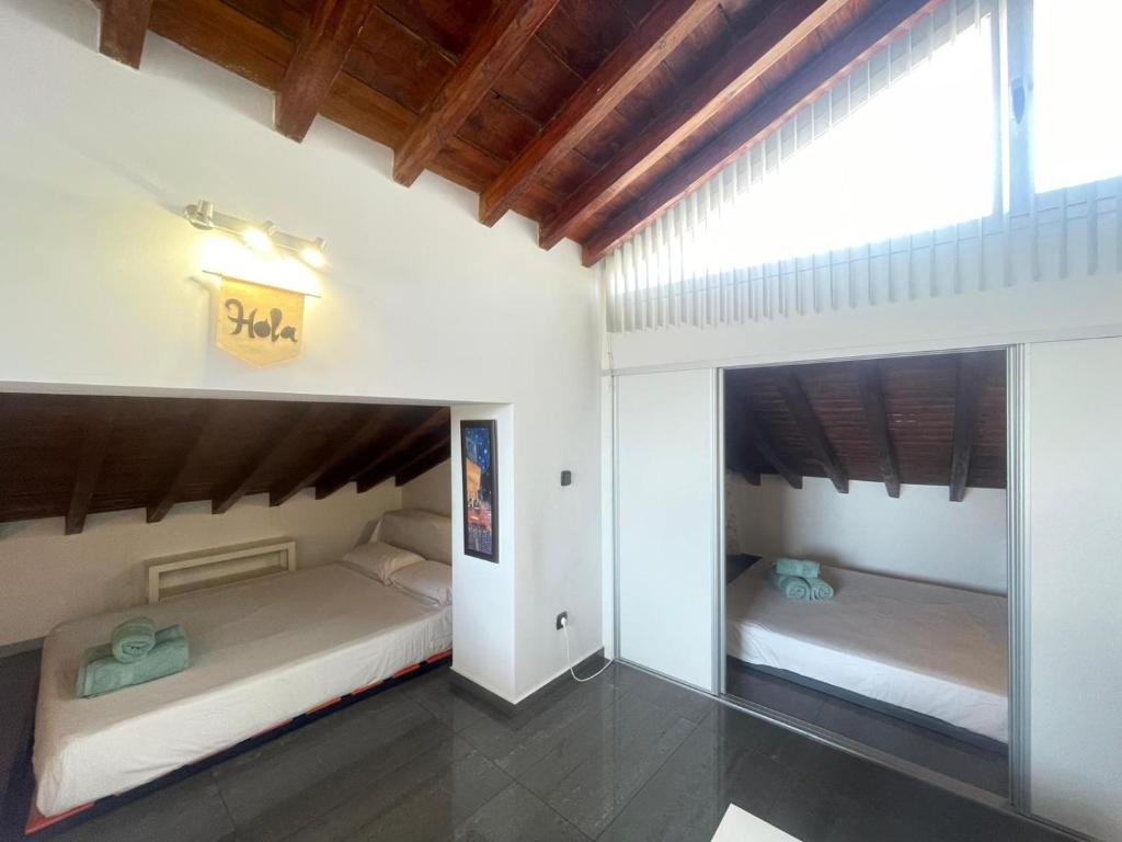 Posteľ alebo postele v izbe v ubytovaní -MalagaSunApts- Private Terrace Studio