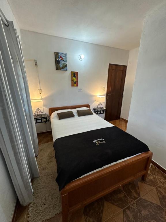 Postel nebo postele na pokoji v ubytování Posada Turistica Alborada