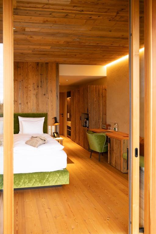 Postel nebo postele na pokoji v ubytování Fräulein Leni Hotel