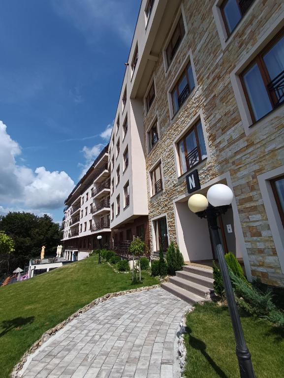 a street light in front of a building at Milmari resort N12 in Kopaonik
