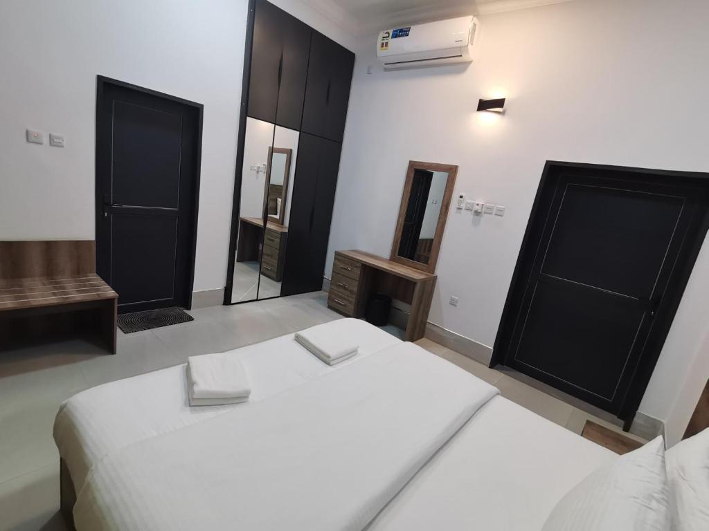 Postel nebo postele na pokoji v ubytování ALOEVERA VILLAS & CAFA