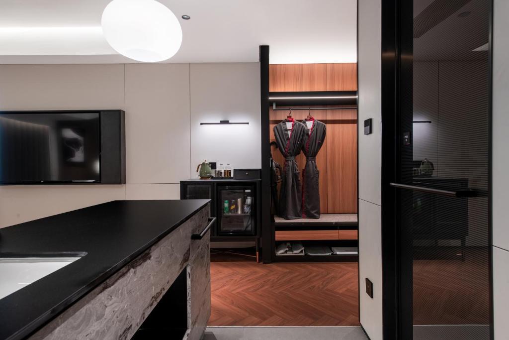 Kuchyň nebo kuchyňský kout v ubytování Intercity Hotel Shantou CHJ