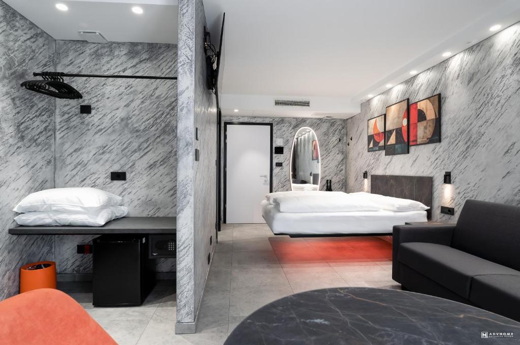 Postel nebo postele na pokoji v ubytování ADV HOME - Exclusive Rooms