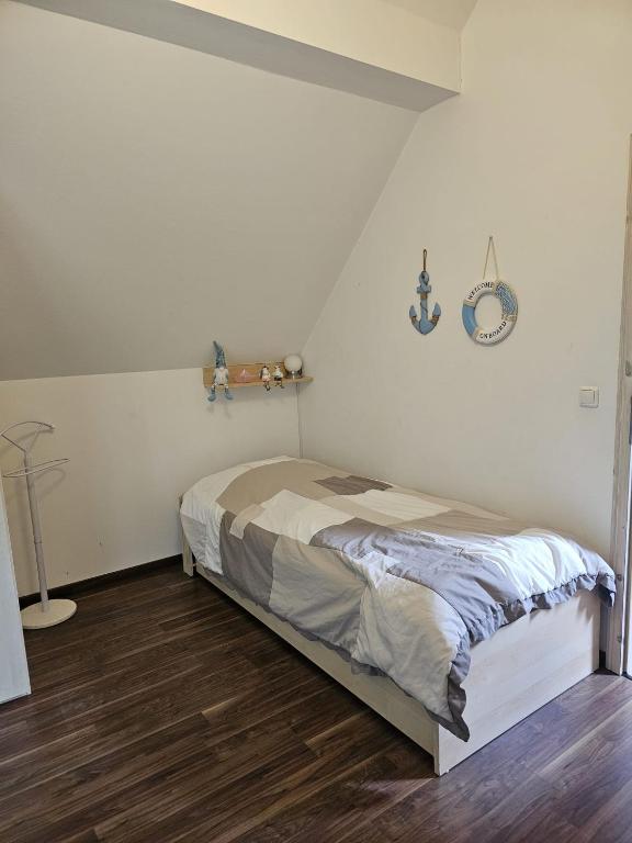 Postel nebo postele na pokoji v ubytování Breeger Boddenidyll