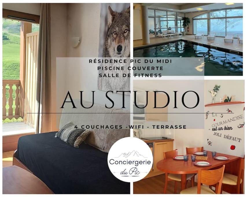 un magazine publicitaire pour une maison avec une pancarte de loup dans l'établissement Studio 4 personnes La Mongie piscine salle de sport wifi, à La Mongie