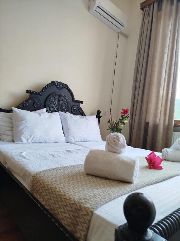 Postel nebo postele na pokoji v ubytování Gremeli Wine & Hotel