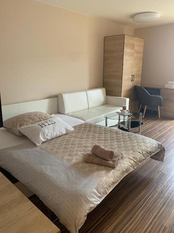 Letto o letti in una camera di ELTAKO penzion