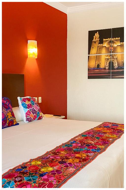 Postel nebo postele na pokoji v ubytování Adhara Hacienda Cancun