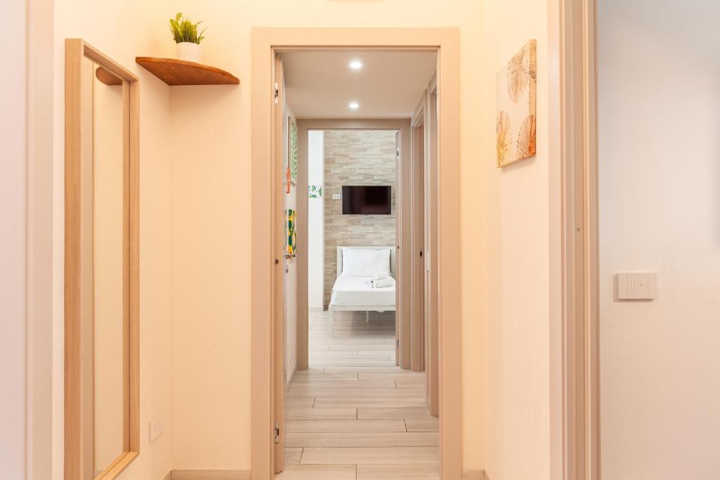 Rúm í herbergi á Hostly- Don Bosco Light Lodge