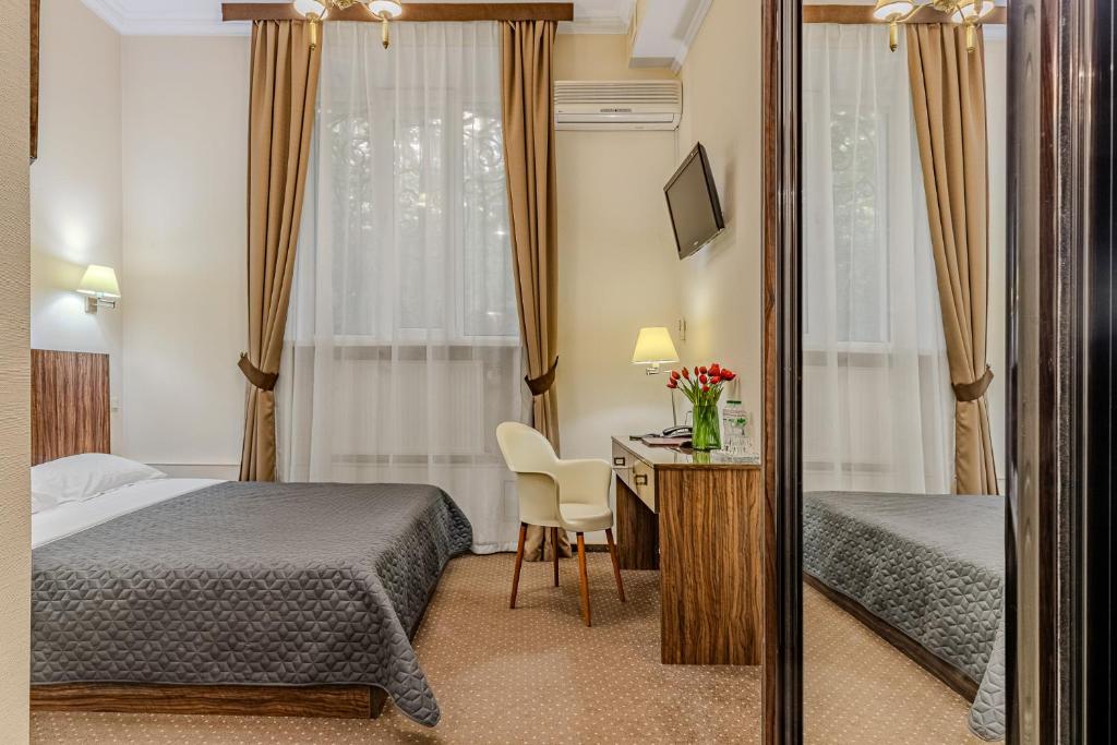 Postel nebo postele na pokoji v ubytování Gallery Hotel Gintama Apgrade