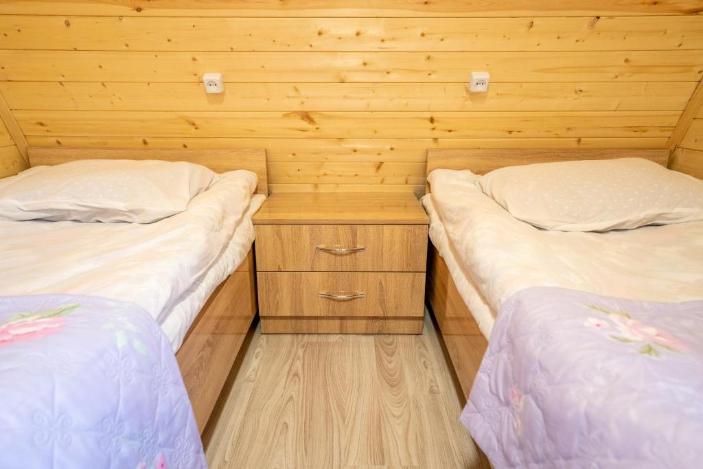 Postel nebo postele na pokoji v ubytování 4 Views Of Ushguli
