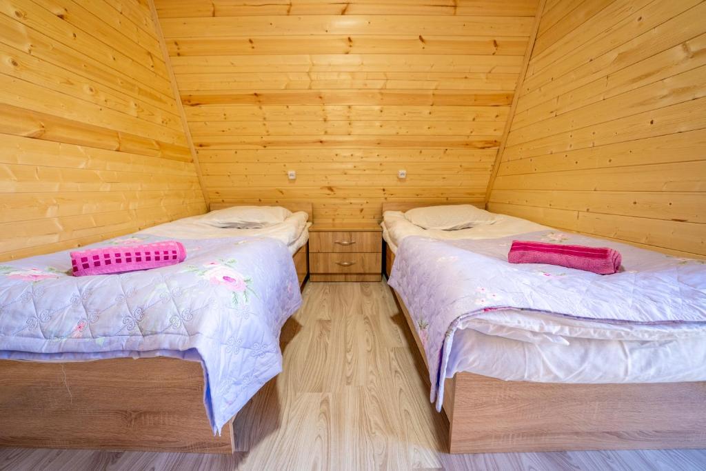 Postel nebo postele na pokoji v ubytování 4 Views Of Ushguli