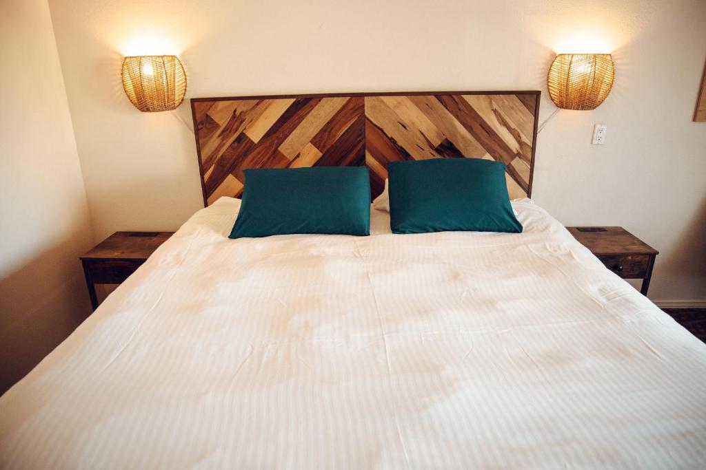 Postel nebo postele na pokoji v ubytování Sugar Loaf Lodge