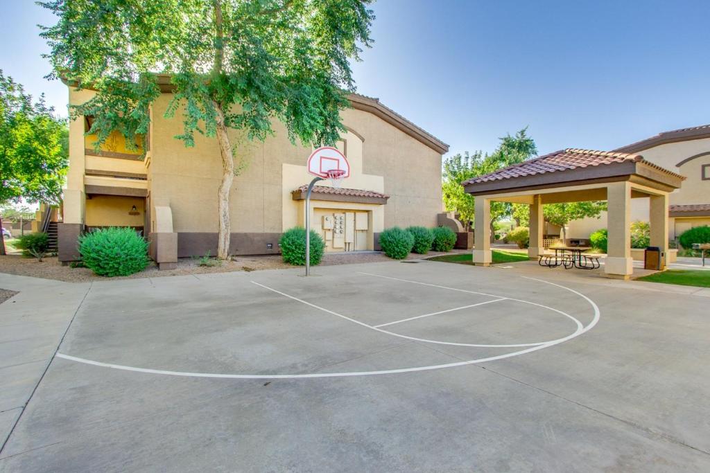 a basketball court in front of a building at Southern #1064 Mesa in Mesa