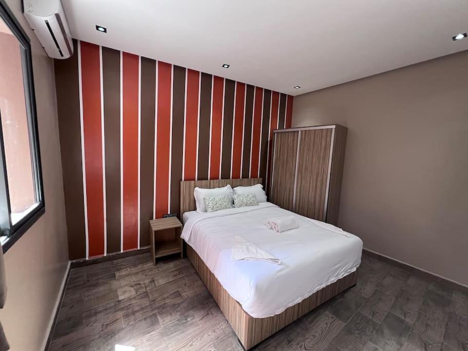 Postel nebo postele na pokoji v ubytování Appartement No 1 vue sur la cour