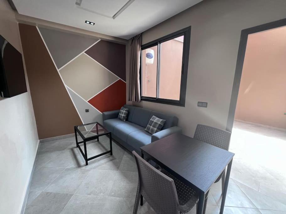 Posezení v ubytování Appartement No 1 vue sur la cour