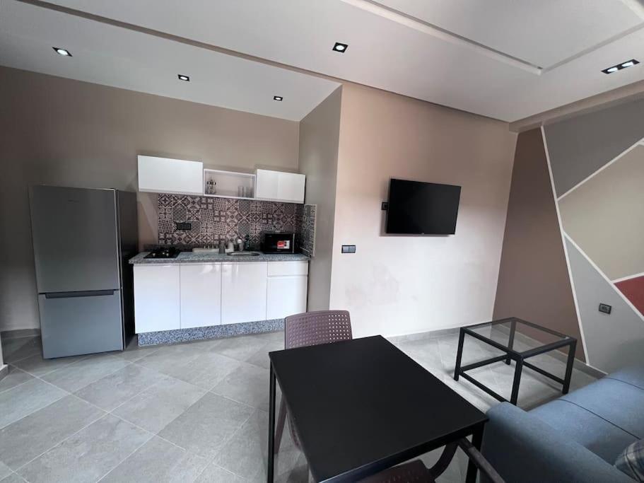 Kuchyň nebo kuchyňský kout v ubytování Appartement No 1 vue sur la cour