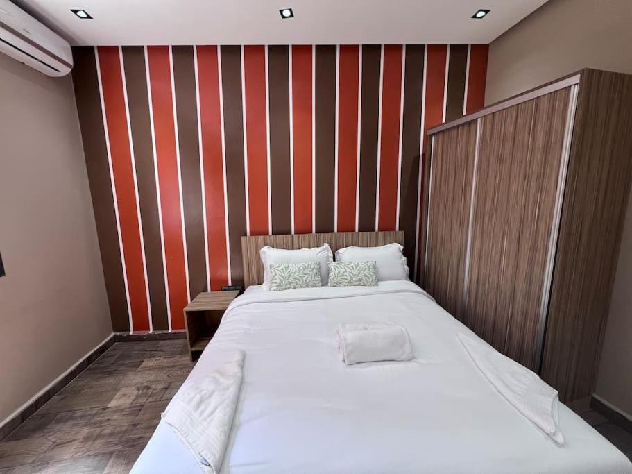 Postel nebo postele na pokoji v ubytování Appartement No 1 vue sur la cour