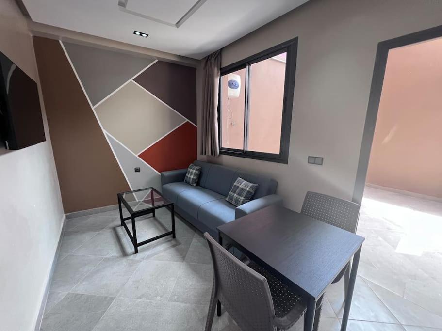 Posezení v ubytování Appartement No 1 vue sur la cour