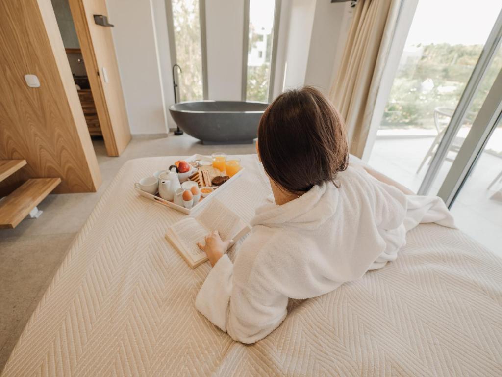 Posteľ alebo postele v izbe v ubytovaní Allure Wellness Retreat