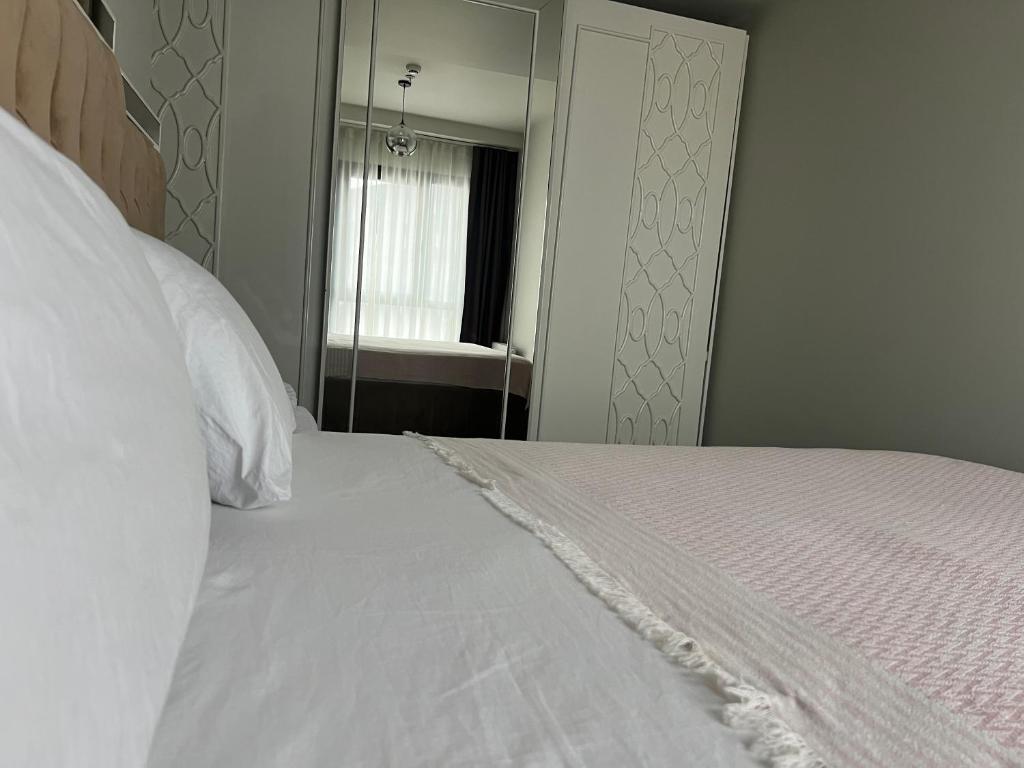 Postel nebo postele na pokoji v ubytování ultra lüxs