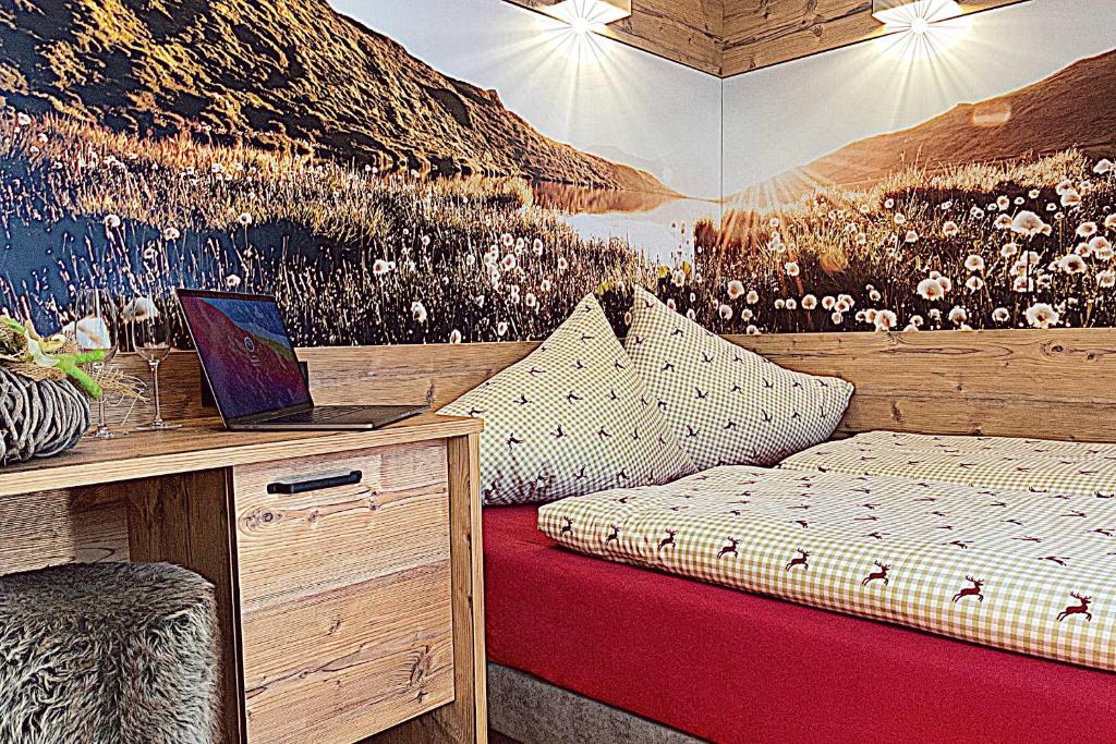 Postel nebo postele na pokoji v ubytování Pircher-Maes Apart & Stubaital