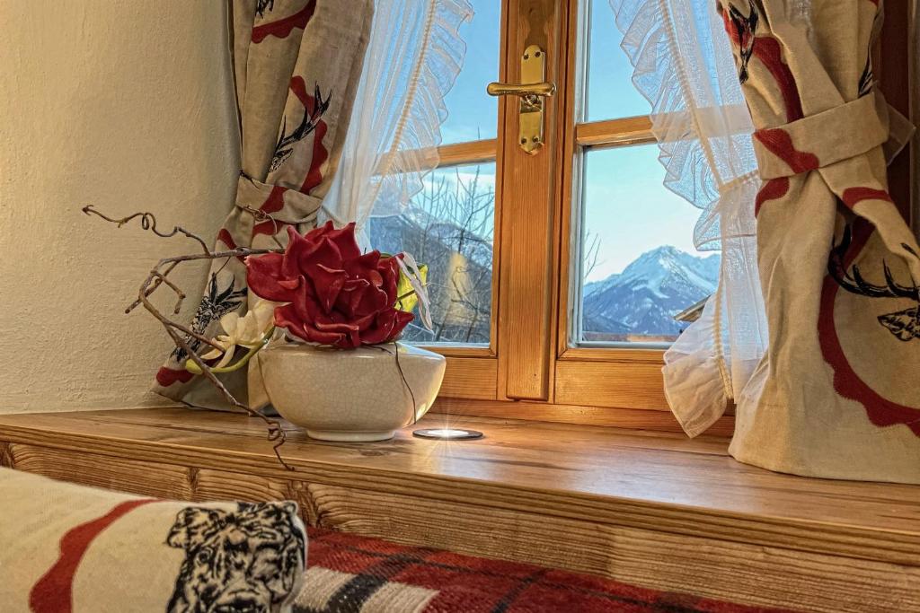 Nespecifikovaný výhled na hory nebo výhled na hory při pohledu z apartmánu