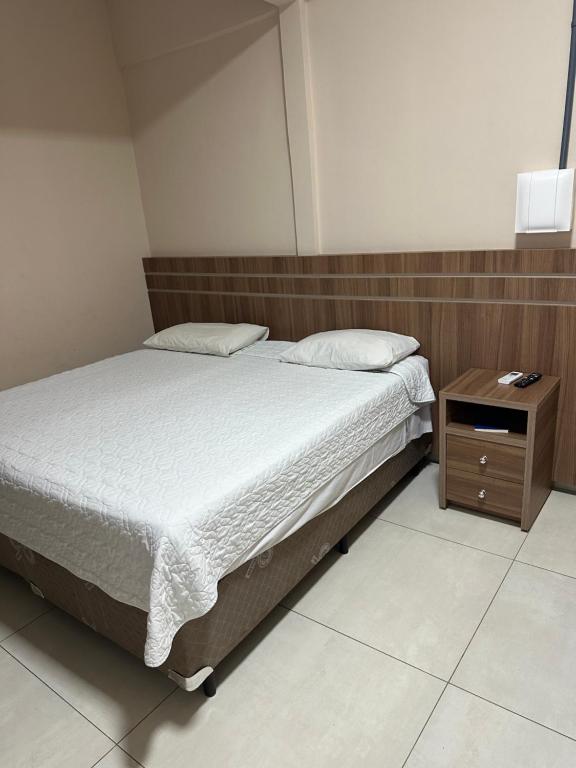 Postel nebo postele na pokoji v ubytování Hotel Alibertti