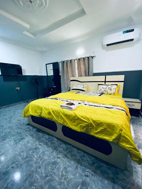 Postel nebo postele na pokoji v ubytování De Empire Hotel