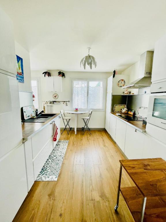 Photo de la galerie de l'établissement L'Arbre aux Hérons - panoramique Nantes WIFI, à Nantes