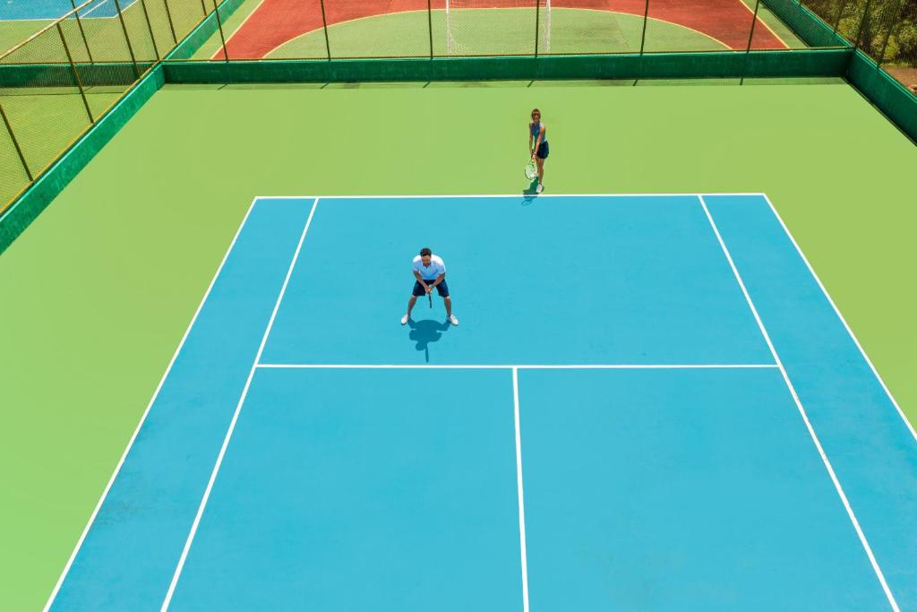 Tenis a/nebo squash v ubytování Bougainvillea 3103 Luxury Apartment - Reserva Conchal nebo okolí