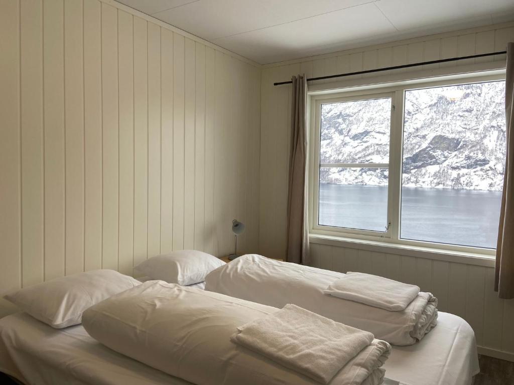 Postel nebo postele na pokoji v ubytování Winjum Apartments Aurland Stegastein