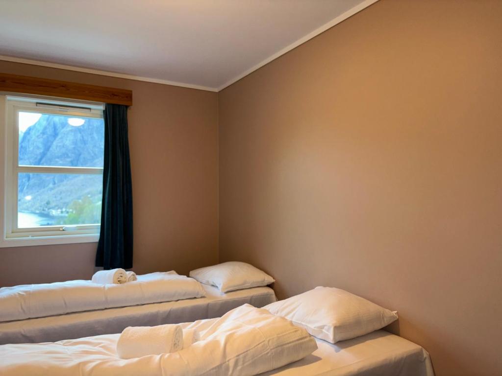 Postel nebo postele na pokoji v ubytování Winjum Apartments Aurland Stegastein
