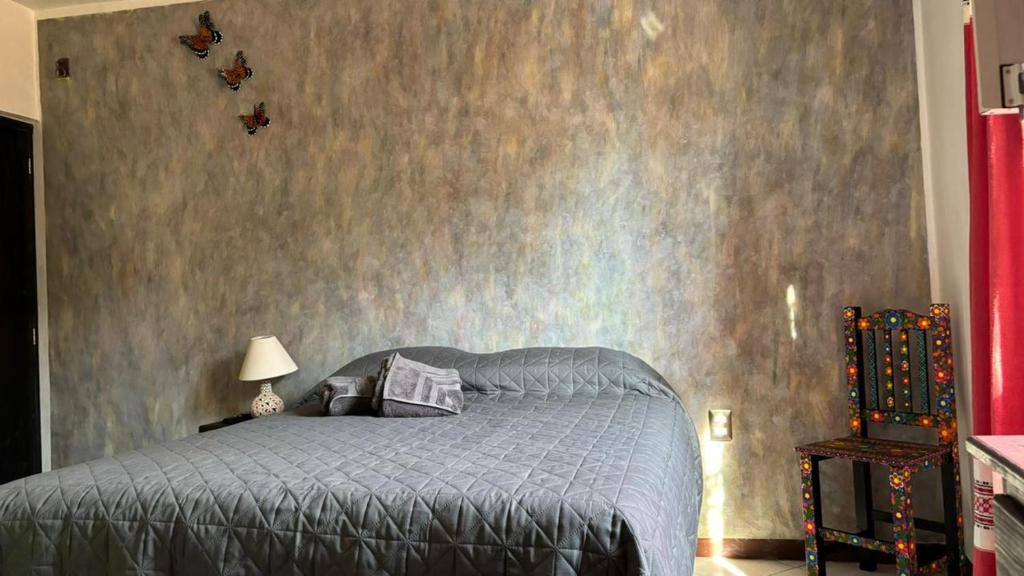 Letto o letti in una camera di Casa los Arcos Oaxaca