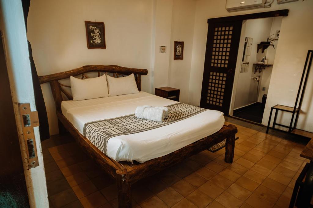Postel nebo postele na pokoji v ubytování Fantasy Lodge