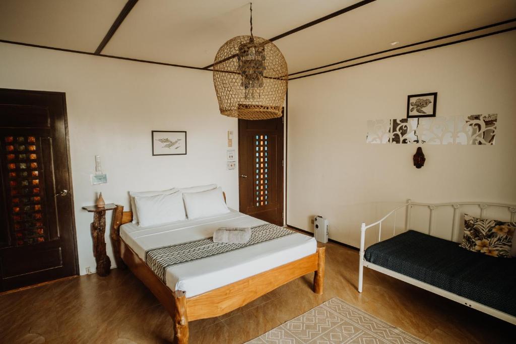 Postel nebo postele na pokoji v ubytování Fantasy Lodge
